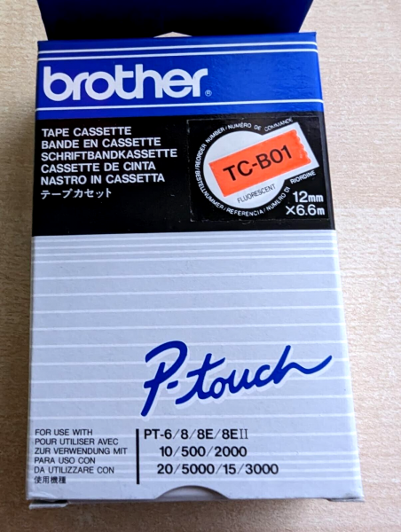 Original Brother TC-B01 Schriftband-Kassette schwarz auf orange 12mm x 6,7m